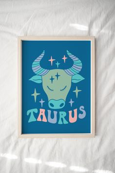 a blue poster with the words taurus on it and a bull's head