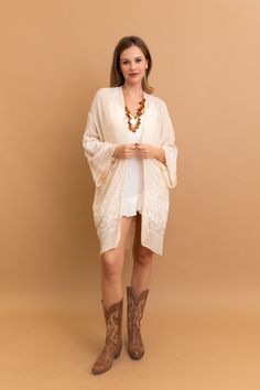 Transform any outfit with our Blossom Breeze Embroidered Kimono. Featuring delicate floral embroidery, this kimono adds a touch of cute, stylish, and trendy charm to your look. Perfect for any occasion, it's a must-have for any fashion-forward wardrobe. #lovemyleto 100% Polyester Imported Spring Floral Embroidered Kimono With Kimono Sleeves, Spring Floral Embroidery Kimono With Kimono Sleeves, Traditional Spring Kimono With Intricate Embroidery, Elegant Floral Embroidered Summer Kimono, Summer Floral Embroidered Kimono With Kimono Sleeves, Floral Embroidered Kimono For Beach In Spring, Summer Floral Embroidery Open Front Kimono, Long Floral Embroidered Summer Kimono, Casual Floral Embroidered Kimono For Fall