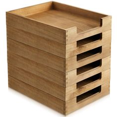 three wooden boxes stacked on top of each other, one is empty and the other has four compartments