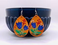 Vibrant, bold earrings which will definitely make a statement! These unique hand-painted wood earrings have a lot of fun, colorful details which can work with many outfits. This statement piece is perfect for a dressy party as well as casual brunch with your crew :) Fun Hand Painted Blue Earrings, Fun Blue Hand Painted Earrings, Dutch Tulips, Bold Earrings, Blue Gifts, Hand Painted Wood, Wood Earrings, Painted Wood, Statement Earrings