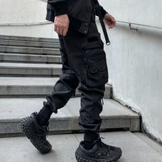 Embrace the spirit of Japanese techwear & army clothing with these game-changer Tactical Pants. Meet the Tactical Techwear Pants, a groundbreaking fusion of style and function tailored for the discerning urban dweller. As you stride confidently through the city, these avant-garde pants effortlessly communicate your distinct fashion sensibilities, commanding attention from all who pass by. These tactical joggers are the epitome of urban fashion, a unique combination of Japanese techwear design an Techwear Cargo Pants, Black Techwear, Loose Leggings, Ninja Pants, Hip Hop Joggers, Cargo Pants Style, Techwear Pants, Harajuku Punk, Tactical Wear