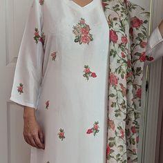 Radiate elegance in this timeless kurta set. An epitome of grace and elegance, this set features a kurta with intricate floral prints, a V-neck, and three-quarter sleeves. It is paired with elasticated palazzos, and a solid dupatta, making it perfect for festivities. Dupatta  has tassel on the corners. The material is very soft and light weight. Good for any kind of occasions like wedding, parties anniversary, Eid  Diwali etc. Palazzo Suit, Indian Suits, Three Quarter Sleeves, Salwar Kameez, Diwali, Indian Fashion, Casual Fashion, Favorite Outfit, Floral Prints