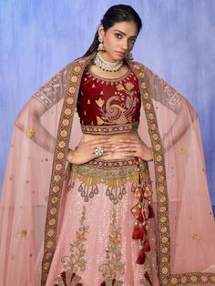 Introducing our stunning peach embroidered velvet wedding lehenga choli with dupatta, a truly unique and stylish outfit that every woman must have in her wardrobe. Crafted with the utmost care and attention to detail, this designer lehenga choli set will make you feel like a princess on your special day.
The lehenga is made of peach color velvet material, giving it a luxurious and exquisite look. It is adorned with beautiful sequin and embroidered work, adding a touch of elegance and sophisticat Velvet Choli With Sheer Dupatta For Wedding, Wedding Velvet Choli With Sheer Dupatta, Velvet Lehenga With Sheer Dupatta For Reception, Semi-stitched Velvet Lehenga With Dupatta, Festive Velvet Lehenga With Sheer Dupatta, Designer Semi-stitched Velvet Lehenga, Unstitched Velvet Lehenga With Resham Embroidery, Anarkali Wedding Velvet Lehenga, Anarkali Velvet Lehenga For Wedding