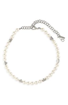 A dainty VLOGO charm based on an archival '70s motif dangles from this choker necklace strung with pyramidal beads and Swarovski imitation pearls. 13" length; 4" extender Pearls: 8mm Lobster clasp closure Brass/Swarovski imitation pearl Made in Italy Classic Adjustable Jewelry With Logo Charm, White Formal Jewelry With Logo Charm, Formal White Jewelry With Logo Charm, Pearl Choker Necklace, Pearl Choker, Valentino Garavani, Lobster Clasp, Choker, Choker Necklace