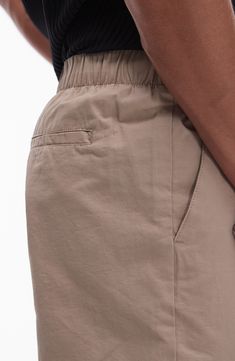 Pure cotton with a hint of stretch keeps you moving comfortably in these tapered pull-on pants that look smart from work to the weekend. 15" leg opening; 13" front rise; 17" back rise Elastic waist Front slant pockets; back welt pockets 98% cotton, 2% elastane Machine wash, line dry Imported Casual Tapered Bottoms With Elastic Waistband, Straight Leg Cotton Cargo Pants With Pull-on Style, Elevated Casual Cotton Bottoms With Pull-on Style, Tapered Bottoms With Hip Pockets For Everyday, Everyday Tapered Pants With Side Pockets, Everyday Tapered Trousers, Relaxed Fit Tapered Leg Everyday Chinos, Everyday Relaxed Fit Tapered Leg Chinos, Elevated Casual Tapered Leg Chinos With Elastic Waistband