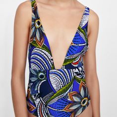 New With Tag Zara Printed Swimsuit Swimsuit With Front And Back Deep Scoop Neckline. Model Height: 5’10” Blue Printed One-piece Bodysuit, Blue V-neck One-piece Swimsuit, Fitted Blue V-neck One Piece, Blue Printed Swimwear For Party, Blue Floral Print V-neck Swimwear, Blue Sleeveless Printed Bodysuit, Blue Printed Sleeveless Bodysuit, Blue Sleeveless Floral One Piece, Sleeveless Blue Floral One Piece