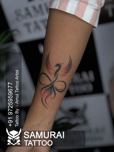 a woman with a tattoo on her arm