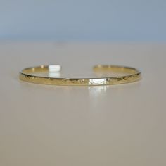 Send some encouragement with this inspiring gold plated cuff bracelet. - 22K Gold plated bracelet engraved with your chosen message. - The  thickness of gold plating is around 0.5 microns (it's sufficient even for jewelry pieces that are exposed to rough wear) - Text, coordinates, numbers outside or inside the cuff  - Up to 90 characters  on each side - Approximately 3mm wide, 6.3'' standard women size, 7'' standard men size - If you need both sides engraving, please contact me before purchase 90 Characters, Pure Gold Jewellery, Personalized Bracelet, Small Jewelry Box, Gold Engraving, Engraved Bracelet, Solid Gold Jewelry, Personalized Bracelets, Gold Plated Bracelets