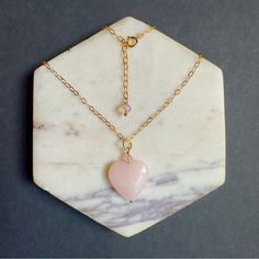 This Gorgeous Necklace Features Natural 13mm.18mm Heart Rose Quartz Pendant With Premium Quality Swarovski Crystal On 925 Sterling Silver Or 14k Gold Filled Chain With 1”Inch Extension Chain. The Extension Chain Has Been Adorned With One Natural 4mm Swarovski Crystal. Size Pendant: 13mm.25mm Chain: 16” Inches ( Custom Length Is Available). This Uniquely Designed Necklace Is A Perfect Asset For Any Occasion And Easy To Wear Everyday. Also A Great Choice Of Gift For Her. *Please Note That Each Of Gold Pink Opal Necklace For Gift, Gold Pink Opal Necklace For Gifting, Pink Heart Beads Jewelry For Anniversary, Elegant Pink Opal Jewelry For Gift, Elegant Pink Opal Jewelry Gift, Pink Heart Beads Necklace For Anniversary, Pink Heart Cut Gemstone Necklace, Pink Birthstone Heart Pendant Necklace, Rose Gold Heart Beads Pendant Necklace