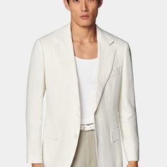 This two-button off-white blazer is cut to our tailored fit with a slightly widened notch lapel, sleek jetted pockets, and a structured shoulder. White Notch Lapel Blazer With Concealed Placket, Timeless White Outerwear With Concealed Placket, Timeless White Outerwear With Lapel Collar, White Timeless Outerwear With Lapel Collar, White Long Sleeve Blazer With Pressed Crease, White Classic Blazer With Concealed Placket, Classic White Outerwear With Concealed Placket, White Business Blazer With Concealed Placket, White Blazer With Concealed Placket