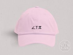 Keep your cool in this cute Acute T Pi Hat. Featuring a punny statement and comfy fit, this baseball cap is your go-to accessory for a cool and casual look. Trendy Everyday Hat With Flat Bill, Trendy Flat Bill Hat For Everyday, Cute Adjustable Hat For Streetwear, Casual Pink Snapback Hat With Flat Bill, Trendy Pink Dad Hat One Size, Pink Casual Dad Hat With Letter Print, Casual Pink Dad Hat With Letter Print, Pink Adjustable Baseball Cap For Everyday, Pink Baseball Cap With Letter Print And Flat Bill