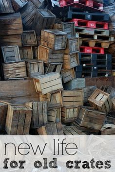 a pile of wooden crates with the words new life for old crates