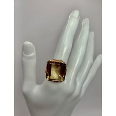 This is part of Chairish’s Fine Jewelry assortment.  Vintage Smoky Topaz Emerald Cut 14k Yellow Gold (585) Cocktail Ring,  Ring size:  6.75 in. Stone approx.: 20.10 mm x 17.18 mm x 11.45 mm Weight of Ring: 13.1 grams Topaz Stone is Approximately 23.18 carat weight  If you would like more information, please contact me via email, mrboult@gmail.com. Modern Citrine Rings For Formal Occasions, Timeless Topaz Ring For Formal Occasions, Modern Yellow Gold Topaz Ring With Rectangular Shape, Modern 14k Gold Crystal Ring For Formal Occasions, Formal Yellow Gold Topaz Ring With Rectangular Stone, Modern Formal Hallmarked Topaz Ring, Luxury Rectangular Topaz Ring For Formal Occasions, Modern Gold Topaz Ring In Rectangular Shape, Timeless Citrine Rings For Formal Occasions