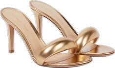 Sleek Gold Sandals With Pointed Toe, Sleek Gold Sandals With Sculpted Heel, Chic Metallic Mules With Sculpted Heel, Luxury Metallic Mules For Summer, Gold High Heel Mules With Sculpted Heel, Luxury Gold Heels In Metallic Leather, Luxury Gold Mules For Spring, Classic Gold Heels With Single Toe Strap, Sleek Gold Sandals With Single Toe Strap