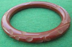 Vintage 1930 - 1940's Carved Brown Bakelite Bangle Bracelet - Free Shipping Vintage Carved Brown Bracelets, Vintage Brown Carved Bracelets, Handmade Bakelite Bangle Bracelet, Vintage Bakelite Bangle Jewelry, Vintage Bakelite Bangle, Mid-century Adjustable Bracelets As Gifts, Mid-century Style Adjustable Bracelets As A Gift, Handmade Round Bakelite Jewelry, Mid-century Bangle Bracelet For Gift