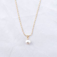 The ultimate symbol of elegance - PEARLS! They are trendy & a beautiful way to add a feminine touch to your outfit! The diamond cut design on the chain also makes the chain sparkle - adding a niced touch! Made of 925 Sterling Silver THICK plating of 14k Gold Made of Freshwater Pearls 16" + 3" Ext Chain Pendant : 6mm Nickel-free & Hypoallergenic Lobster Clasp Closure Timeless Rose Gold Cable Chain Jewelry, Timeless Rose Gold Jewelry With Cable Chain, Fine Jewelry With Round Pendant Cable Chain, Timeless Cable Chain Jewelry For Anniversary, Minimalist Cable Chain Jewelry Gift, Delicate Chain 14k White Gold Necklace, Minimalist Jewelry With Cable Chain For Anniversary, Pearl White Gold Plated Round Jewelry, White Gold Cable Chain Jewelry For Gifts