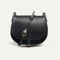 Timeless Black Satchel For Daily Use, Timeless Black Bag With Detachable Strap, Timeless Black Bags With Adjustable Strap, Timeless Black Crossbody Flap Bag, Timeless Black Bag With Adjustable Strap, Timeless Black Shoulder Flap Bag, Timeless Black Saddle Bag For Evening, Black Saddle Bag With Adjustable Strap For Formal Occasions, Black Pouch Saddle Bag For Daily Use