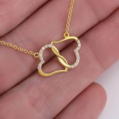 A stunning, infinitely connected pair of 10K solid yellow gold hearts that perfectly symbolizes your Everlasting Love. Each heart is intricately accented with 18 pave set diamonds with a 0.07-carat weight which adds magnificent sparkle.Set inside a Luxurious Mahogany Style Gift Box, featuring a super-bright LED to showcase the beautiful pendant.Necklace Details: Pendant: Solid 10k Gold• 0.5" x 0.6" (12x15mm) • Weight .04 oz (1.2 grams)• 18 Single Cut Diamonds • Carat Weight 0.07ctChain and Clasp Yellow Gold Heart Necklace, Wife Necklace, Gold Hearts, Solid Gold Necklace, Gold Diamond Necklace, Gold Heart Necklace, Anniversary Gifts For Wife, To Infinity And Beyond, Mom Necklace