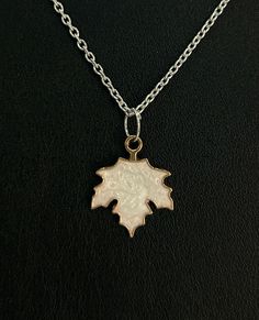 Maple Leaf Charm, Dainty Leaf pendant, Leaf pendant, Minimalist Jewelry, Pendant with chain, Maple leaf pendant, Charm jewelry, White leaf Jewelry       :   Minimalist Shape         :   Maple Leaf Quantity     :   1 Item Code  :   #Extra Lot Wholesale also available on every items .. Wholesale prices are different . Wholesale lots supply:) Top quality Minimalist Jewelry AAA ++ Quality natural stone. Hand made with love and cleansed by Sage. Hand polished, Healing crystal, Birthstone We take order as well in other shape & size . We take order for big quantity as well & we can supply other crystal in any size & any shape also. If you are looking for more sizes and shapes and stones which are not listed please let us know, we will make special listing for you. All the pictures are taken into Pendant Minimalist, Jewelry Minimalist, Jewelry White, Pendant With Chain, Leaf Jewelry, White Leaf, Leaf Charms, Leaf Pendant, Jewelry Pendant