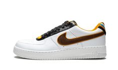 The Ricardo Tisci x Nike Air Force 1 is a high-fashion version of the iconic sneaker. Stylish changes made to the silhouette include a re-do of the toe-box perforations and a stack of overlayed v-shapes on the heel. Yellow, blue, orange, black, and brown colors liven up the white sneaker base. As part of a special collection that launched in 2014, designer Ricardo Tisci radically transformed the Air Force 1 silhouette in various heights. | Air Force 1 SP/Tisci Ricardo Tisci, Painted Nikes, White Air Forces, Riccardo Tisci, Kicks Shoes, Air Force 1 High, Nike Air Force 1 Low, Mens Nike Air, Air Force Ones