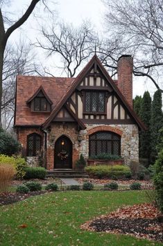 a house that is sitting in the grass