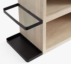 an open book shelf with two shelves and one shelf has black metal straps on the bottom