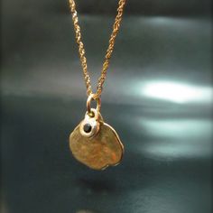 The Necklace And The Pendant Made From 14 Karats Solid Yellow Gold. Pendant Width 0.51inch/ 13mm. Chain Length 17.7inch/ 45 Cm'. 1 Black Diamond 0.02ct Hanging On A Small Pendant. Necklace For Women. Necklace For Men. Gold Handmade Necklace With Two Pendants. One Big, And On Small Bezel Set With Black Diamond. Delicate, And Timeless, A Gift That Each Woman Or Men Like To Have. Chain Available In All Sizes, Color Gold And Karat, And Matte Or Shining Finish. Round Hammered Fine Jewelry Necklaces, Gold Nugget Jewelry For Jewelry Making, Yellow Gold Hammered Round Charm Necklace, Round Hammered Fine Jewelry Necklace, Elegant Black Jewelry With Coin Pendant, Elegant 14k Gold Nugget Necklace, Fine Jewelry Hammered Necklaces For Anniversary, Hammered Fine Jewelry Necklace For Anniversary, Elegant Hammered Pendant Charm Necklace