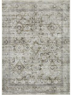 an antique style rug in grey and beige tones