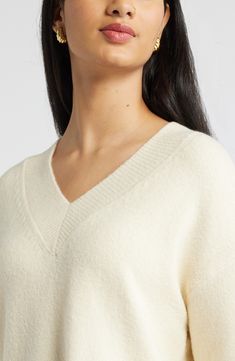 Amp up your cozy vibe in this slouchy V-neck designed with ribbed trim for a soft look and feel. 21" length (size medium) V-neck Long sleeves 40% nylon, 36% acrylic, 20% cotton, 4% spandex Hand wash, dry flat Imported V Neck Sweater, Neck Designs, Vneck Sweater, Hand Wash, Nordstrom, Long Sleeves, Size Medium, Spandex, Trim