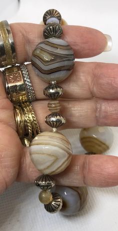 I am not sure of the origin of this agate, I think maybe Brazil or Australia. gorgeous stuff. never saw banding like this, or honeycomb face ting. Tissue Paper Wrapping, Bracelet Display, Ruby Pendant, Banded Agate, Pearl Gemstone, Key Pendant, Agate Beads, Etsy Jewelry, 14kt Gold