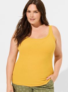 FIT Model is 5'11” wearing size 0. . Measures 30” from shoulder (size 2). Fixed straps. MATERIALS + CARE Cotton-modal blend ribbed knit fabric. . 57% cotton, 38% modal, 5% spandex. Machine wash cold. Tumble dry low. Imported. DETAILS Scoop neck. Sleeveless. . The best plus size women's cotton modal rib double scoop neck tank t-shirts in mineral yellow made of cottonmodalrib. Blue Shirt With Jeans, Maurices Plus Size, Best Tank Tops, Ribbed Tank Top, Long Torso, Ribbed Tank Tops, Ribbed Tank, List Style, Rib Knit