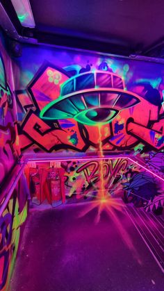 a room filled with lots of colorful graffiti