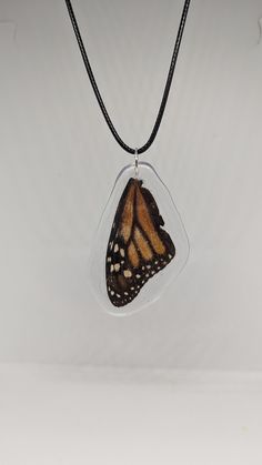 real monarch butterfly wing necklace, made with resin.  No butterflies were harmed, only found. necklace goes between 17 and 19 inches long Butterfly Wing Pendant, Butterfly Wing Necklace, Bug Necklace, Fort Pierce, Accessories Bags Shoes, Insect Art, Bracelets Diy, Butterfly Wing, Wing Necklace