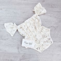 A beautiful kiaan boho beige romper 100% cotton. Featuring off the shoulder style. Perfectly shaped waist with stretchy elastic. This beautiful romper is just perfect for those summer beach days.
** Not Lined **
** Listing is for the romper and headband. **
 
♡ GORGEOUS HANDMADE ITEMS FOR YOUR LITTLE MISS. ( Size 0000 - 5 years.)
♡ This is item is made to order.
♡ Fabric pattern placement and shape may be different than to images shown.
♡ WASHING CARE -We highly recommend hand washing this item to maintain its quality life, though it has been tried and tested in a machine wash, ensuring you use a wash mesh bag on gentle cycle. Cream Short Sleeve Bubble Romper For Summer, Cream Bubble Romper For Beach In Summer, Cream Bubble Romper For Beach And Summer, Beige Bubble Romper With Ruffles For Summer, White Summer Bubble Romper For Beach, Summer Beige Bubble Romper With Ruffles, Beige Ruffled Bubble Romper For Summer, Beige Cotton Bubble Romper For Summer, Summer Beige Cotton Bubble Romper