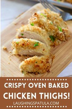 crispy oven baked chicken thighs on a cutting board with text overlay that reads crispy oven baked chicken thighs