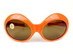 SUPERSOLFLEX original 60s womens sunglasses, Jackie O Made in Italy Authentic - vintage very rare model Original orange acetate frames Original brown crystal lenses New Old Stock - Never been worn Near Mint condition Width: 150mm Temple length: 140mm Height: 56mm SHIPMENT + All items shipped with tracking number. + Generic case included. Retro Orange Cat Eye Sunglasses, Retro Orange Polarized Sunglasses, Vintage Plastic Sunglasses With Uva Protection, Retro Orange Sunglasses With Polarized Lenses, Orange Retro Sunglasses For Party, Vintage Orange Sunglasses With Uv Protection, Vintage Orange Sunglasses With Mirrored Lenses, 60s Sunglasses, 70s Sunglasses