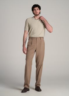 About Our Tall Men's Relaxed Tapered Pleated Trouser The Go-To Pants for Tall Men For the guy over 6' who values both style and comfort, these relaxed tapered pleated slacks for tall men are a game-changer. Designed specifically for the unique needs of tall guys, they offer a sophisticated look without sacrificing comfort. Embrace a modern style of men's tall pants that stands out in any setting.• Modern tapered fit• Versatile design for both casual and formal settings• Sustainably made with 68% Relaxed Fit Pants Outfit Men, Formal Comfortable Outfit, Men’s Pleated Pants Outfit, Mens High Rise Pants, High Rise Pants Men, Outfit Ideas For Tall Guys, Men’s Pants Fashion, Men Trouser Design, Models Men Fashion