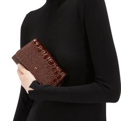 Crocodile-print leather clutch bag with metal detail, chain shoulder strap, pocket and inner card slots. Elegant Crocodile Pattern Shoulder Bag For Work, Chic Leather Wallet On Chain For Work, Luxury Brown Envelope Clutch, Luxury Brown Wallets, Luxury Brown Wallets For Office, Luxury Brown Clutch With Card Slots, Evening Clutch Shoulder Bag With Interior Card Slots, Elegant Brown Leather Wallet On Chain, Workwear Clutch With Removable Pouch