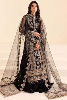 Elegant Embellished Black Pakistani Wedding Dress in Pishwas Style Elegant Black Gown With Dabka Work, Black Gown With Dabka Work For Reception, Black Party Wear Lehenga With Dabka Work, Party Wear Black Lehenga With Dabka Work, Black Lehenga With Dabka Work For Party Wear, Black Wedding Lehenga With Dabka Work, Wedding Lehenga With Dabka Work In Black, Semi-stitched Elegant Wedding Dress For Designer Wear, Black Embroidered Semi-stitched Gown