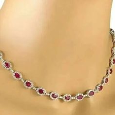 "22 Ct Oval Simulated Red Ruby Women's Tennis Necklace, 14K White Gold Plated, Halo Tennis Women's Necklaces ✤Details✤ Handmade item Ships from a small business in India Metal : Yellow Gold, Rose Gold, White/Silver Gold Finish Gemstone: Cubic Zirconia Gem color: Red Plating color: White  Style: Art Deco  Can be personalized Made to Order ✤Description✤ The most unique jewelry you can find, the perfect gift for you and your loved one.It Is Simulated Gemstone & Diamond And The Cut Of The Stone Is Excellent. The Product Is Available In All Types Of Gold Plated Such As White Gold Plated, Yellow Gold Plated, Rose Gold Plated. * Material : High Quality Solid 925 Sterling Silver * Metal Color: White/Yellow/Rose Gold and Made to Order. * Diamond type: Ruby * Diamond Color : Red  * Main Diamonds Cut Classic Oval Ruby Necklace, Red Oval Necklace For Formal Occasions, Red Oval Necklaces For Formal Occasions, Oval Ruby Necklaces For Anniversary, Elegant Red Oval Ruby Jewelry, Red Ruby Round Necklaces, Oval Ruby Jewelry With 17 Jewels, Oval Red Necklace For Anniversary, Red Gemstone Round Necklace