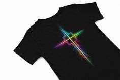 Abstract Neon Cross t shirt Christian Apparel Religious T-shirt Faith Shirt Jesus Shirt Bible Verse Shirt Christian Clothing Religious Gift Spiritual T-shirt Inspirational Shirt Unique Tags: Cross Graphic Tee Vintage Cross Shirt Minimalist Cross Design Faith-Based Fashion Religious Streetwear Christian Hipster Tee Modern Cross Art Sacred Symbol Shirt Cross and Scripture Blessed Apparel  This beautifully designed Cross T-Shirt is more than just a piece of clothing--it's a powerful statement of fa Faith Apparel, Cross Shirts, Faith Clothing, Jesus Shirt, Neon Rainbow, Jesus Christus, Faith Shirt, Graphic Tees Vintage, Inspirational Shirt