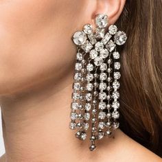 Enhance your look with these stunning crystal tassel clip earrings, designed for women who want to add a touch of sophistication to their ensemble. Perfect for weddings, parties, or as a thoughtful gift, these earrings are a beautiful addition to any jewelry collection. Key Features: Material: Crafted with high-quality rhinestones and copper Comfortable: No piercing required for effortless wear Geometric Design: The elegant geometry adds a modern touch to any outfit Trendy Style: Stay on-trend w Jewelry Geometry, Earrings No Piercing, Piercing For Women, Tassel Earing, Bridal Clip, Clip Earrings, Elegant Earrings, Accessories Rings, Shape Patterns