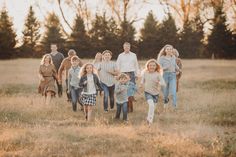 a group of children running through a field