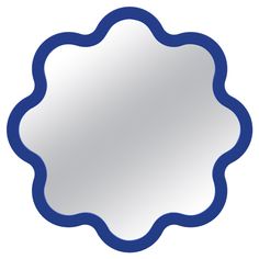 a blue scalloped mirror on a white background