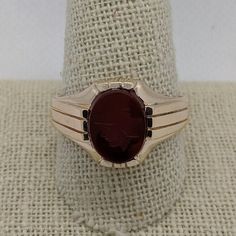 Victorian-era gold jewelry was often made in yellow gold with a soft rose gold hue. This handsome 1800s ring is crafted in 14k rosy gold that has a warm, rich appearance. The focal point is a hard-stone intaglio of a Roman soldier carved from carnelian. This ring is a generous size 12 and would make a unique wedding ring or right-hand statement ring. Please note that this ring is a true antique with over a 100-year history. You will notice in the photos there is white metal on the bottom of the Classic 14k Gold Signet Ring With Cabochon, Classic 14k Gold Brown Ring, Classic Brown Signet Ring For Anniversary, Vintage 14k Rose Gold Rings For Formal Occasions, Brown Polished Finish Signet Ring For Formal Occasions, Formal Brown Signet Ring With Polished Finish, Classic Rose Gold Ruby Ring, Rose Gold Signet Ring With Gemstone, Rose Gold 14k Gemstone Signet Ring