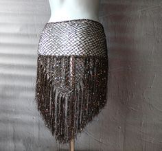 Crochet sequins brown-gold scarf hip belt will be a great addition to your belly dance costume. Great for any performance outfit  *has mesh base with many sequins, long drawstrings at the sides and fringes *One size fits most: length with fringes 22,8"(58cm) , width of the triangle part is about 31,5"(80cm) width with drawstrings about 47,2" (120cm) *Custom length and width available *Yarn- viscose with sequins *Care instructions: hand wash recommend, lay flat to dry Other hip scarves you can se Crochet Sequins, Belt Crochet, Belly Dance Hip Scarf, Hip Scarf, Gold Scarf, Hip Scarves, Lady In Waiting, Hip Belt, Belly Dance Costume