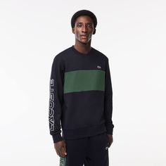 This sweatshirt from Lacoste, sportswear creators since 1933, is a lesson in expert design and bold crocodile styling. Made from cotton fleece for comfort, with a colorblock design and contrast details, including bold branding on the sleeve, for style. Sports Cotton Color Block Sweatshirt, Streetwear Crew Neck Sweatshirt With Contrast Panels, Black Color Block Sweatshirt For Sports, Sporty Color Block Fleece Sweatshirt, Color Block Athleisure Sweatshirt For Sports, Athleisure Color Block Sweatshirt For Sports, Sporty Color Block Sweater For Streetwear, Green Crew Neck Sweatshirt With Contrast Color, Casual Sports Sweatshirt With Contrast Color