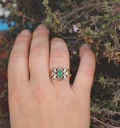 This stunning ring is my last and favourite design 14k gold ring with emerald and diamonds Central emerald stone weight : 0.6 carat Diamond weight : 0.12 carat Weight ring : 4.2 gram Top ring length : 2 cm Top ring width : 1.4 cm Elegant Green Opal Ring In 14k Gold, Heirloom Tsavorite Emerald Ring In Gold, Oval Green Rose Cut Diamond Rings, Yellow Gold Emerald Open Ring, Green Emerald Cluster Ring With Rose Cut Diamonds, Oval Emerald Ring With Rose Cut Diamonds, Heirloom Emerald Promise Ring, Fine Jewelry Opal Ring With Rose Cut Diamonds, 14k Gold Green Diamond Ring With Gemstone