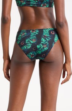 A eye-catching pattern brings sunny flair to these classic hipster bikini bottoms. Moderate back coverage Lined 80% polyamide, 20% elastane Hand wash, dry flat Made in Portugal Printed Tie-side Beachwear Bottoms, Multicolor Seamless Bottoms For Summer, Printed Elastane Tankini For The Beach, Tie-side Bottoms For Poolside, Elastane Tie-side Bottoms For Poolside, Printed Elastane Swimwear For Beach, Printed Stretch Bottoms For Poolside, Stretch Printed Bottoms For Poolside, Tropical Style Printed Tie-side Bottoms