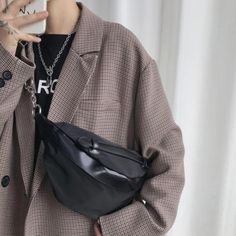 This semi-glossy bum bag sits nicely on the shoulder with the partial chain-link strap for security. Its medium size fits enough for a long night out in the city, yet small enough to make the minimalist in you happy. Its sleek design makes it great for day-to-day wear too. A must-have for those who like to be functional yet stylish.
Gender: UnisexMaterial: Nylon, PolyesterSize: Mini (30 cm Width x 17 cm Height), with varied depthType: Messenger / CrossbodyClosure: Zipper Trendy Chest Bag With Mobile Phone Pocket, Trendy Large Capacity Chest Bag, Trendy Crossbody Chest Bag, Trendy Large Capacity Chest Bag For Streetwear, Trendy Solid Color Crossbody Belt Bag, Trendy Crossbody Belt Bag, Trendy Streetwear Mobile Phone Bag, Trendy Mobile Phone Bag For Streetwear, Trendy Everyday Chest Bag